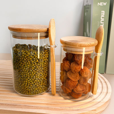 Récipient de stockage de nourriture en verre transparent avec conception fonctionnelle et couvercle rond en bambou