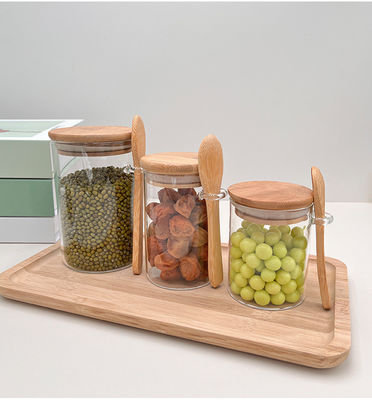 Récipient de stockage de nourriture en verre transparent avec conception fonctionnelle et couvercle rond en bambou