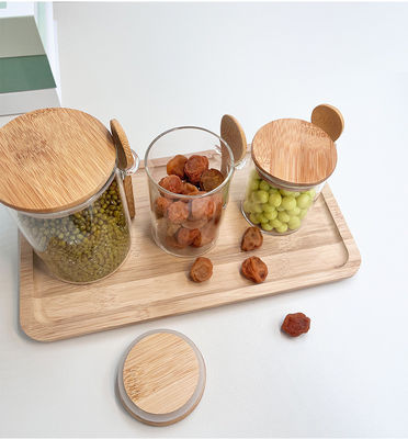 Récipient de stockage de nourriture en verre transparent avec conception fonctionnelle et couvercle rond en bambou