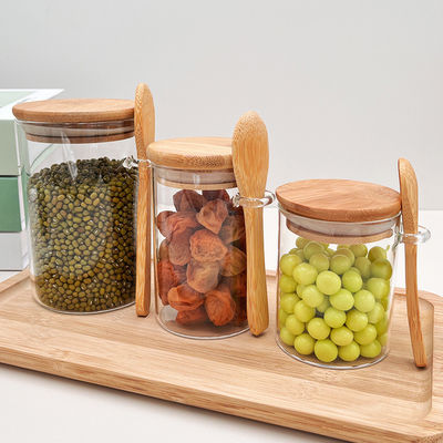 Produits alimentaires Bouteilles de bambou en verre rond avec couvercle et cuillère Bonbons Épices Grains de café Noix Cookies