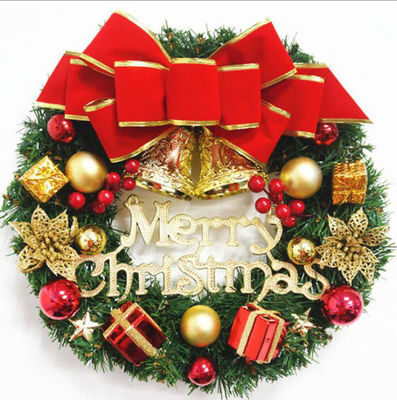 Une couronne XMAS ronde pour la porte d'entrée Une couronne avec logo personnalisé