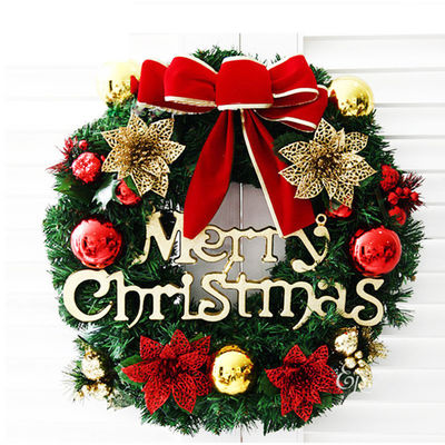 Une couronne XMAS ronde pour la porte d'entrée Une couronne avec logo personnalisé